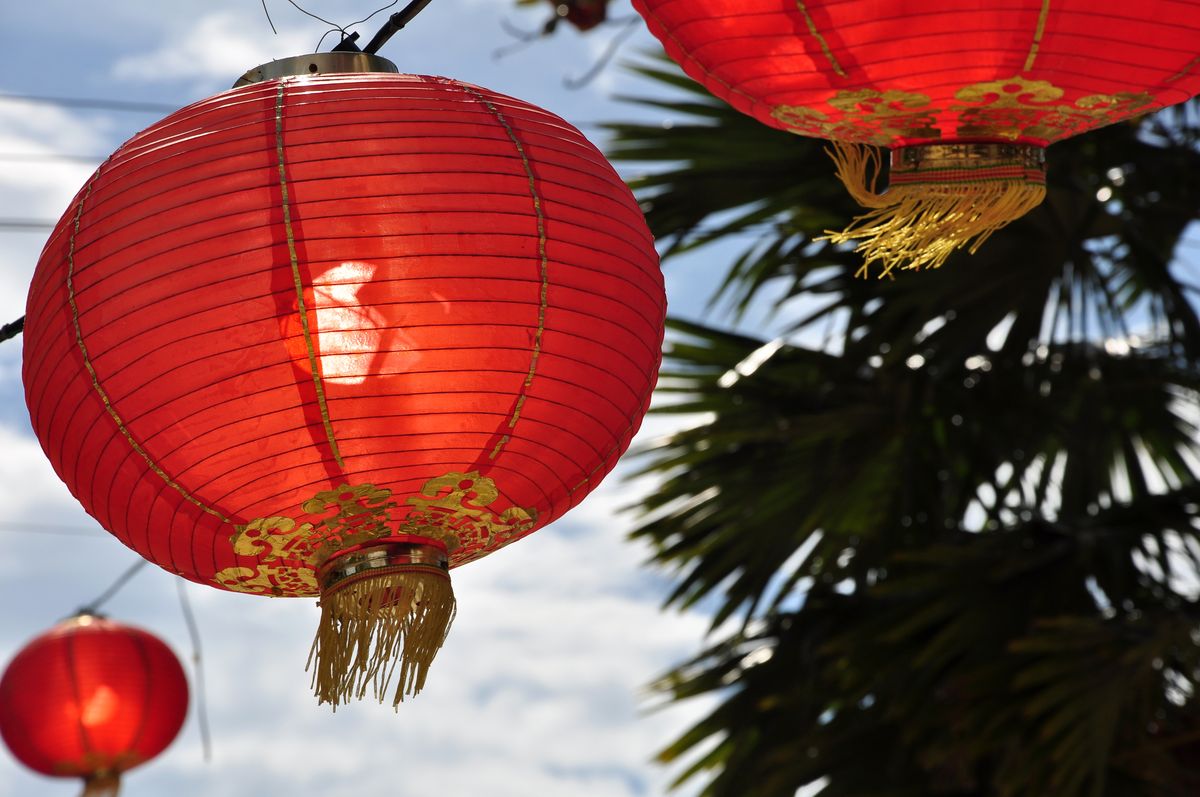 Red Chinese New Year lanterns in Kota Kinabalu, the festive season when mahjong etiquette matters most at family tables