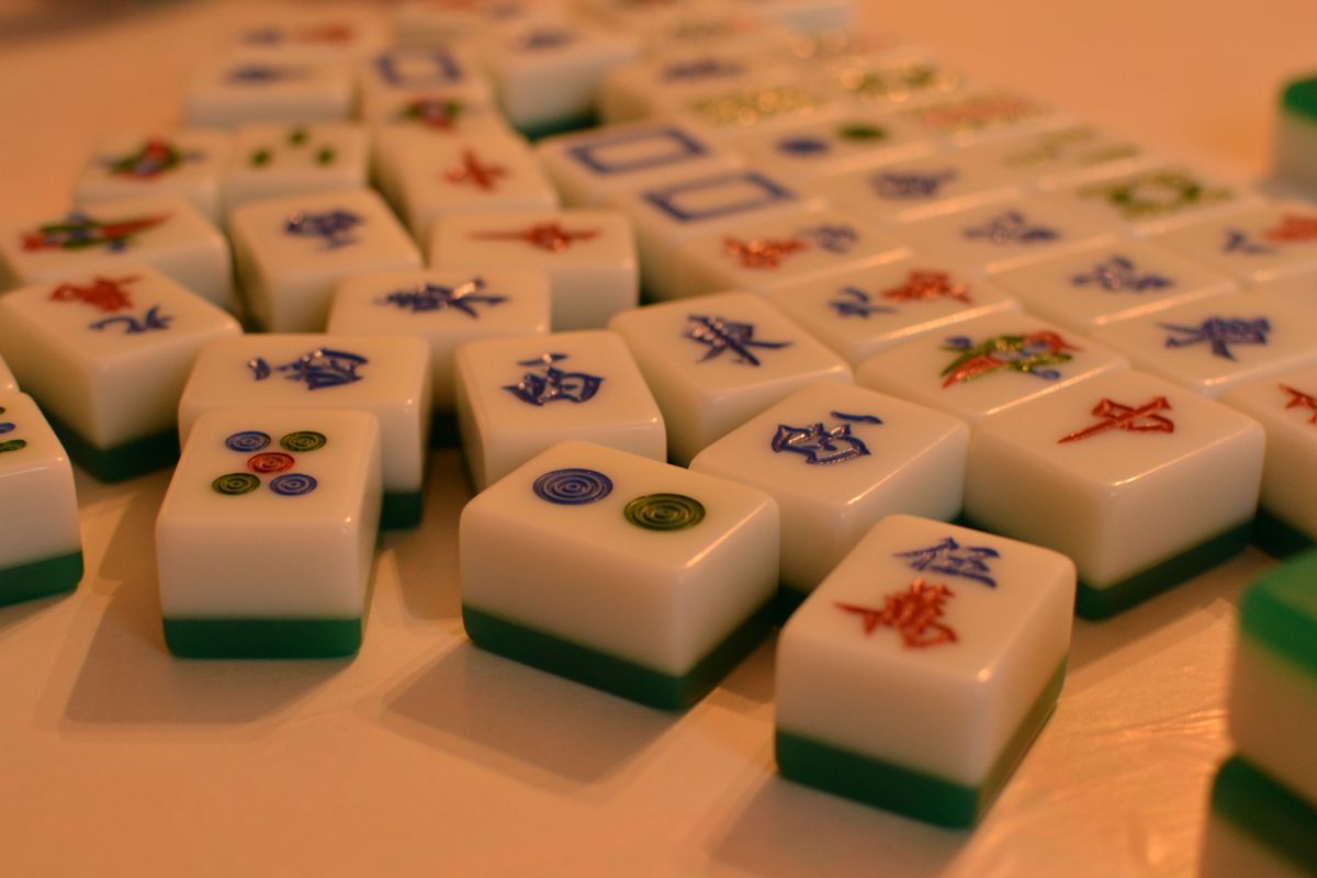 About us at Mahjong Malaysia: close-up of mahjong tiles on a table